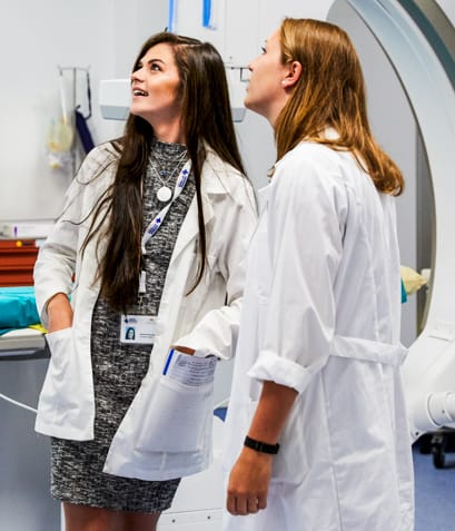 Students examining medical equipment (Athens, 2019).