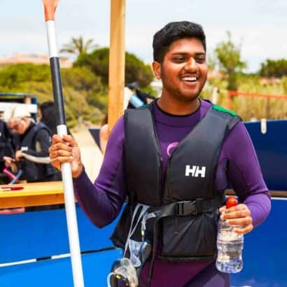 A student getting ready to kayak.